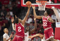 Indiana's Michael Durr (2) and Jordan Geronimo (22) reach for a rebound against Nebraska's Bryce McGowens, left, and Eduardo Andre (35) during the first half of an NCAA college basketball game Monday, Jan. 17, 2022, in Lincoln, Neb. (AP Photo/Rebecca S. Gratz)