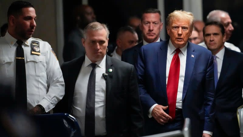 Former President Donald Trump leaves Manhattan criminal court, Feb. 15, 2024, in New York. Judge Juan Manuel Merchan agreed Friday, March 16, to delay former President Donald Trump’s hush-money criminal trial in New York until mid-April after his lawyers said they needed more time to sift through new evidence.