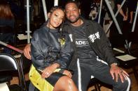 Gabrielle Union and Dwyane Wade sat front row at the Li-Ning show during Couture Week in Paris.