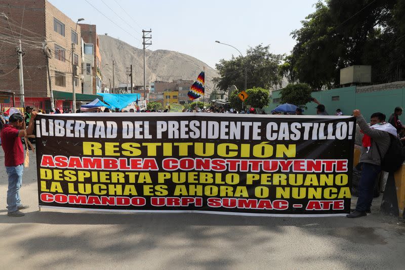 Supporters of Peru's former President Castillo gather outside the police prison where Castillo is being held, in Lima