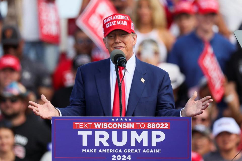Former US president and Republican presidential candidate Donald Trump speaks during his latest campaign rally in Racine, Wisconsin, on June 18 2024 (Reuters)