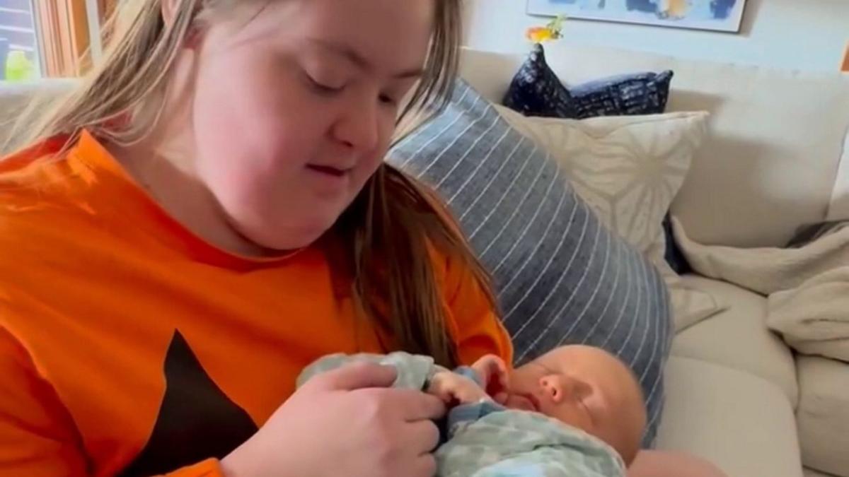 Soon-to-be aunt with Down syndrome used toy doll to get used to babies