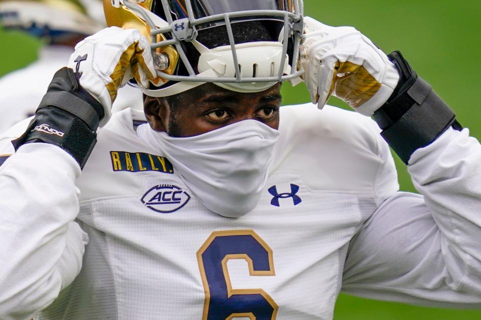 A mask can’t hide the talent of Notre Dame rover Jeremiah Owusu-Koramoah.