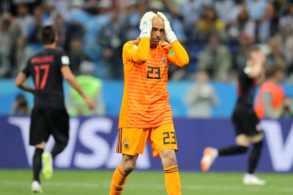 <p>Argentina goalkeeper Willy Caballero reacts to his howler which gave Croatia the lead. (Getty) </p>