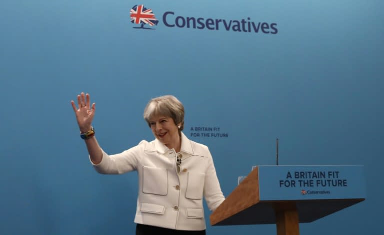 Britain's Prime Minister Theresa May delivers her speech at the Conservative Party’s Spring Forum in London on March 17, 2018