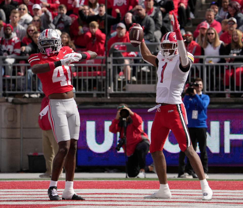 Maryland receiver Kaden Prather looks for a touchdown call while Ohio State safety Josh Proctor correctly judged the catch to be incomplete.
