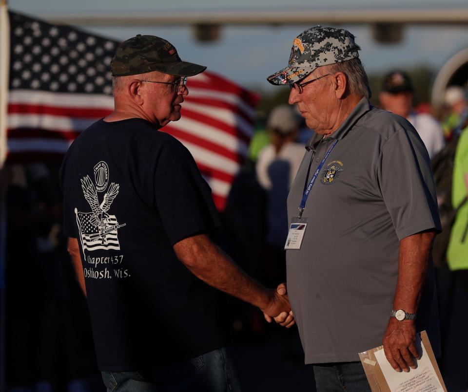 Veterans are welcomed back from a Yellow Ribbon Honor Flight on July 29, 2022, at EAA AirVenture Oshkosh 2022, in Oshkosh, Wis.