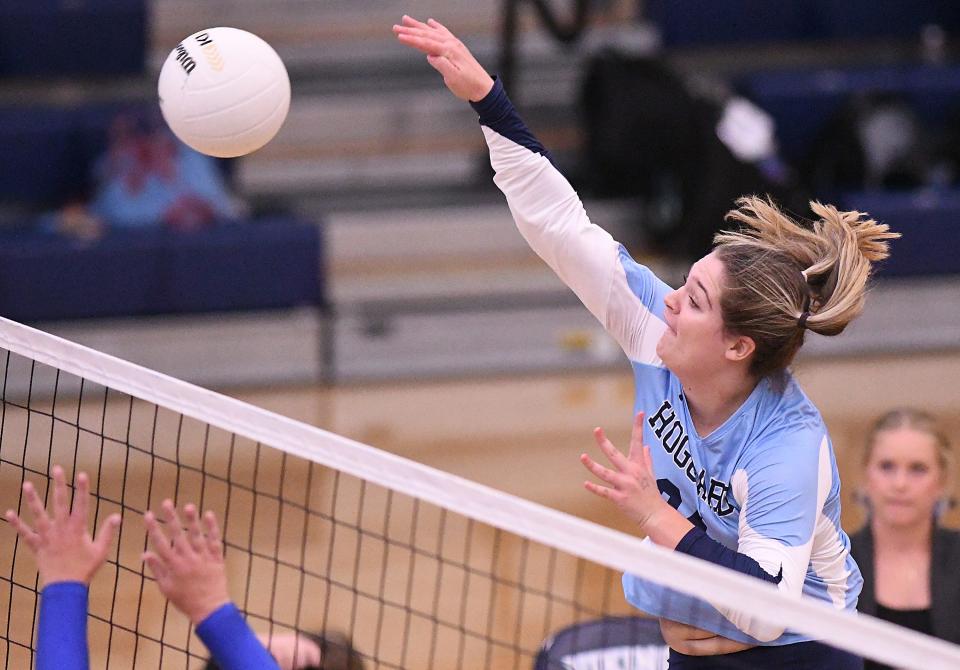 Hoggard's #24 	Mia Elder spikes as Hoggard took on Laney for the MEC Volleyball Championship Wednesday Oct. 18, 2023 at the Sheila Boles Gymnasium in Wilmington, N.C. Hoggard won the Championship 3-0. KEN BLEVINS/STARNEWS