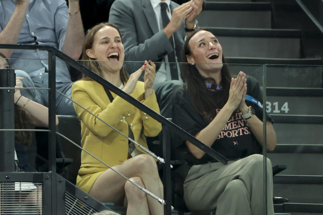 Natalie Portman clapping at the gymnastics women's team final.