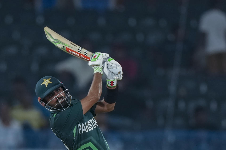 Pakistan's captain Babar Azam plays a shot during the ICC Cricket World Cup warmup match between Pakistan and Australia in Hyderabad, India, Tuesday, Oct. 3, 2023. (AP Photo/Mahesh Kumar A.)