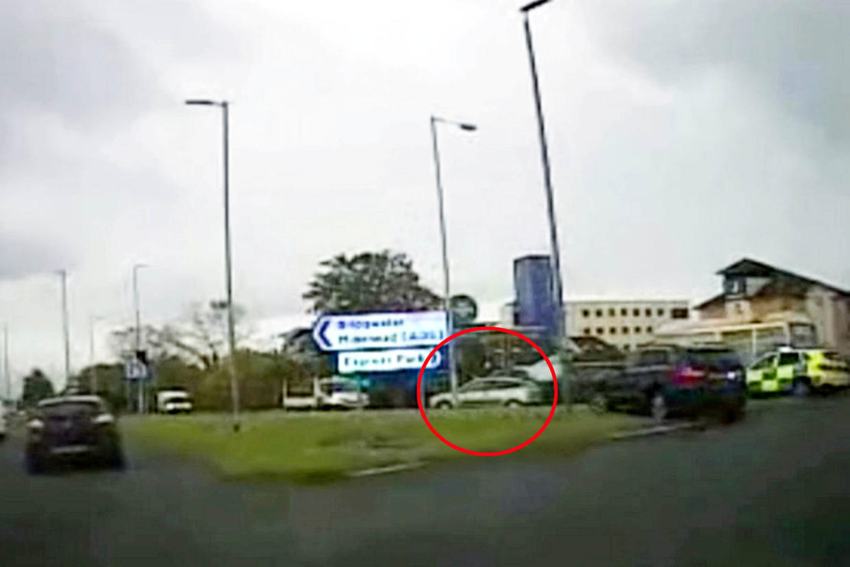 Craig Gibbs being chased by police.  A man who was recorded speeding at more than 100mph on the M5 in Somerset while under the influence of drugs has today (Wednesday 25 November) been jailed for 16 months.  See SWNS story SWBRchase.  Craig Gibbs was disqualified from driving when officers from the Roads Policing Unit received reports that he was driving a green Ford Focus on the A38 near Bridgwater on Monday 5 October. After he failed to stop for police, a pursuit commenced.  The 32-year-old reached speeds of 100mph as officers pursued him on the M5 to Wellington and back, eventually exiting at Junction 23 towards Bridgwater.  Having exited the motorway, Gibbs was seen to ignore red lights and drive on the wrong side of the road as he tried to evade police.  After turning onto a side road and colliding with several cars, officers were able to detain Gibbs when his car became wedged between parked vehicles, despite him attempting to force the vehicle through.  He was arrested on suspicion of dangerous drivin