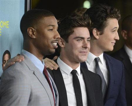 From L-R: Cast members Michael B. Jordan, Zac Efron and Miles Teller attend the premiere of the film "That Awkward Moment" in Los Angeles January 27, 2014. REUTERS/Phil McCarten