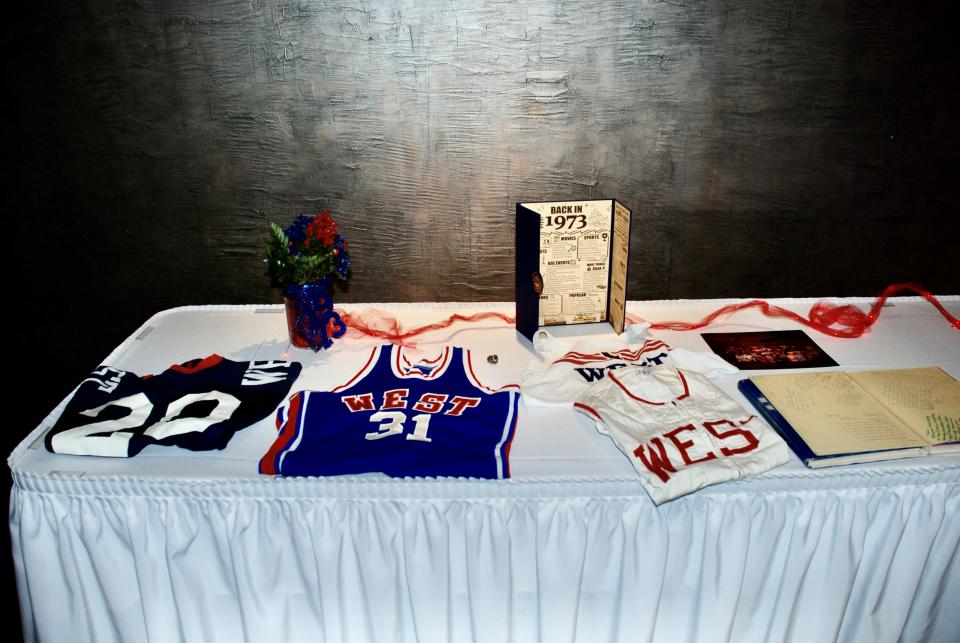 A table was set up for the West High Class of 1973’s 50-year reunion at the Foundry with old jerseys and other school memorabilia. Aug. 12, 2023