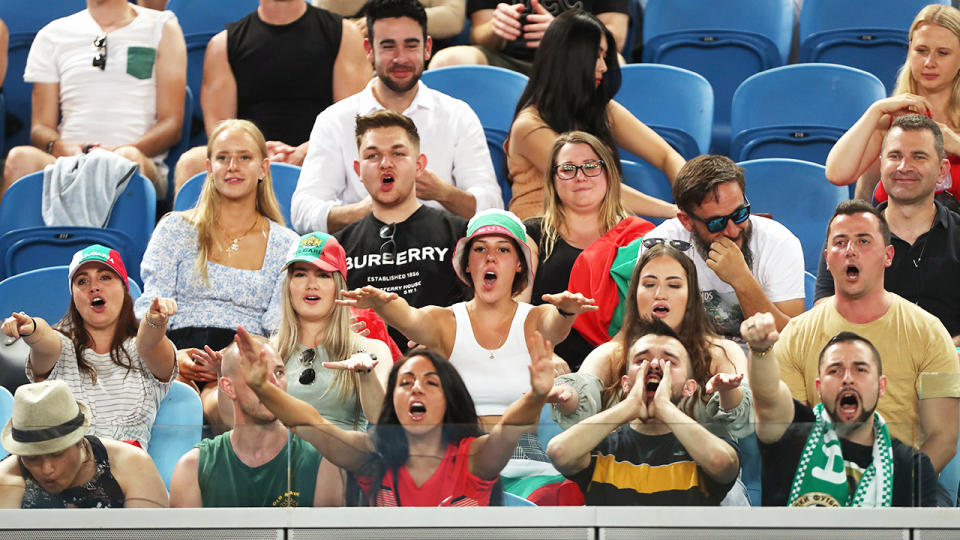 Fans, pictured here watching the Australian Open at Melbourne Park on Thursday night.