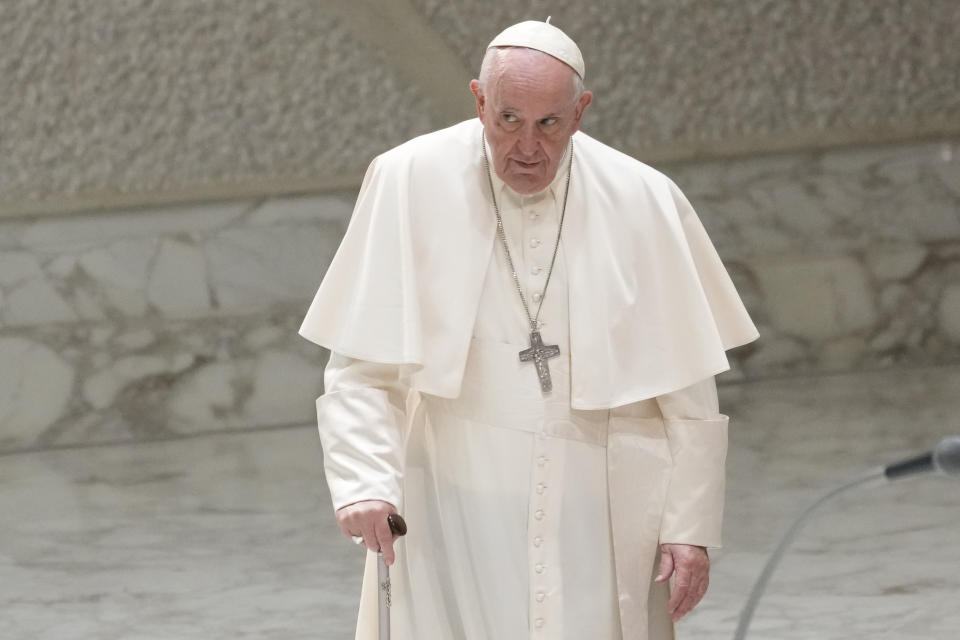 Pope Francis arrives for an audience with members of the International Christian Union of Business Executives, in the Pope Paul VI hall at the Vatican, Friday, Oct. 21, 2022. (AP Photo/Andrew Medichini)