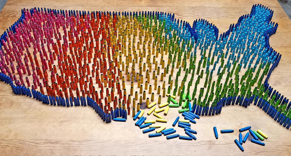 Artist Maureen Cain painted thousands of bullets in bright colors and placed them a sites of gun violence across the U.S. (Photo: Maureen Cain)