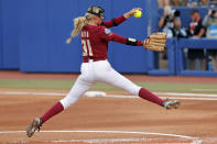 Florida State's Makenna Reid pitches against Washington during the first inning of an NCAA softball Women's College World Series game Saturday, June 3, 2023, in Oklahoma City. (AP Photo/Nate Billings)