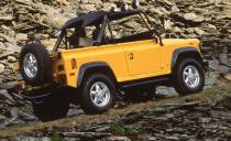 <p>The stubbier Defender 90 was imported from 1994 to 1997 in far greater numbers. Early trucks were available only with a five-speed manual and had a softtop or a removable fiberglass hardtop. Later models gained an automatic transmission option and a full-metal hardtop similar to that on the Defender 110. Defender 90s sat tall and came from the factory with nearly 32-inch diameter all-terrain tires, so they were equipped to conquer rough off-road trails. The Defender felt old school when it launched here with an interior that looked like it belonged in the 1970s. And fuel economy was poor—15 mpg on the highway. So carrying a canister of extra fuel on a long trip to a remote location was a smart move.</p>