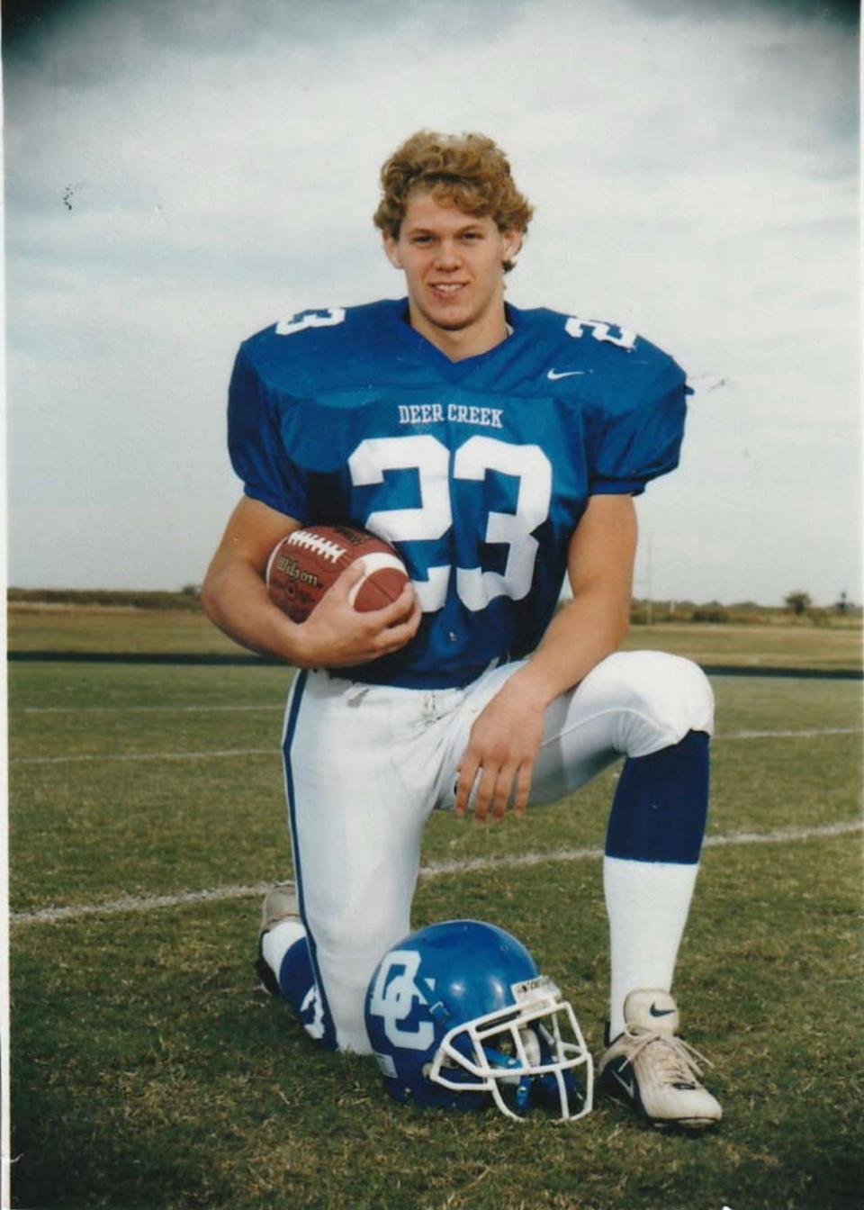 Tyler Tidwell played on Deer Creek's 2000 state championship football team. He went on to play at Navy before serving in the Marines.