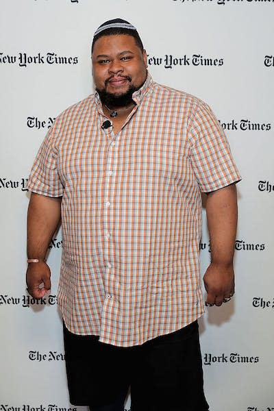 <span class="caption">Michael W. Twitty attends the New York Times Food for Tomorrow Conference in 2016.</span> <span class="attribution"><a class="link " href="https://www.gettyimages.com/detail/news-photo/michael-w-twitty-attends-the-new-york-times-food-for-news-photo/610643252?phrase=michael%20twitty&adppopup=true" rel="nofollow noopener" target="_blank" data-ylk="slk:Neilson Barnard/Getty Images for New York Times;elm:context_link;itc:0;sec:content-canvas">Neilson Barnard/Getty Images for New York Times</a></span>