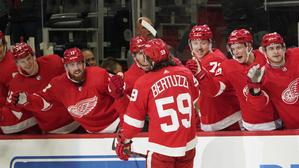 Detroit Red Wings left wing Tyler Bertuzzi (59) celebrates his goal against the Tampa Bay Lightning in the second period of an NHL hockey game Thursday, Oct. 14, 2021, in Detroit. (AP Photo/Paul Sancya)