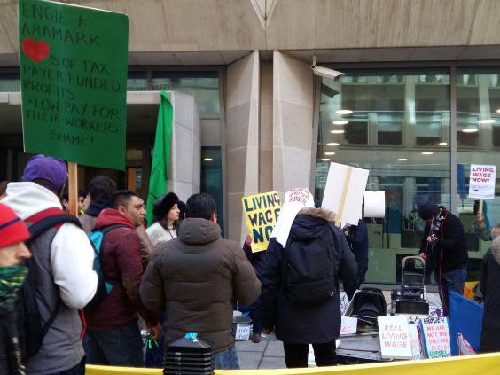 Members of the United Voices of the World union on strike outside the Ministry of Justice headquarters in London on 22 January (Lizzie Dearden)