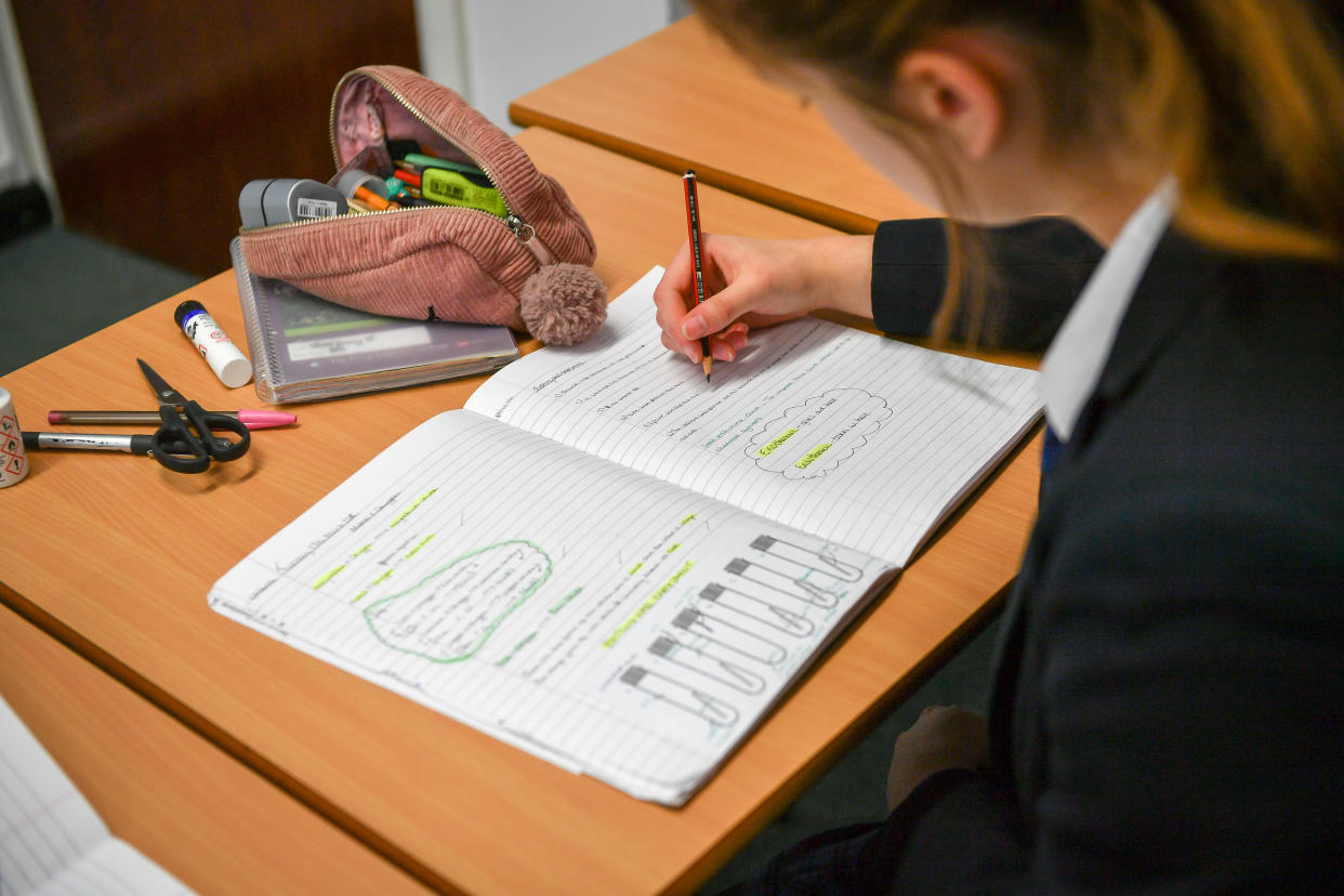 Students study and write in their exercise books in class at Royal High School Bath, which is a day and boarding school for girls aged 3-18 and also part of The Girls' Day School Trust, the leading network of independent girls' schools in the UK.  (Photo by Ben Birchall/PA Images via Getty Images)