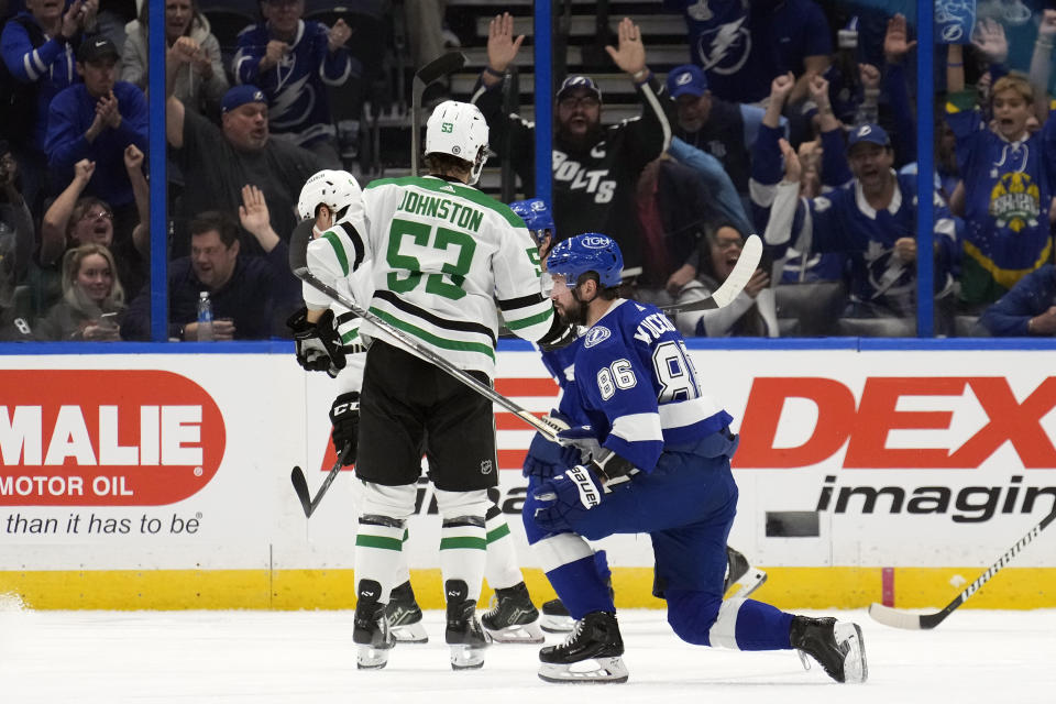 Tampa Bay Lightning right wing Nikita Kucherov (86) reacts after scoring against the Dallas Stars during the first period of an NHL hockey game Monday, Dec. 4, 2023, in Tampa, Fla. (AP Photo/Chris O'Meara)
