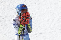 United States' Mikaela Shiffrin reacts after taking gold in an alpine ski World Championships giant slalom, in Meribel, France, Thursday, Feb. 16, 2023. (AP Photo/Gabriele Facciotti)