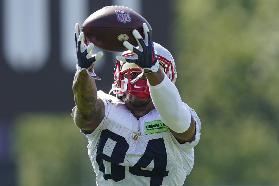 New England Patriots wide receiver Kendrick Bourne (84) catches the ball during the NFL football team's training camp, Wednesday, Aug. 3, 2022, in Foxborough, Mass. (AP Photo/Steven Senne)