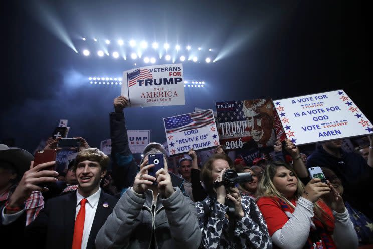 Supporters listen as Indiana Gov. Mike Pence speaks to a campaign rally in Manchester, N.H. (Photo: Charles Krupa/AP)