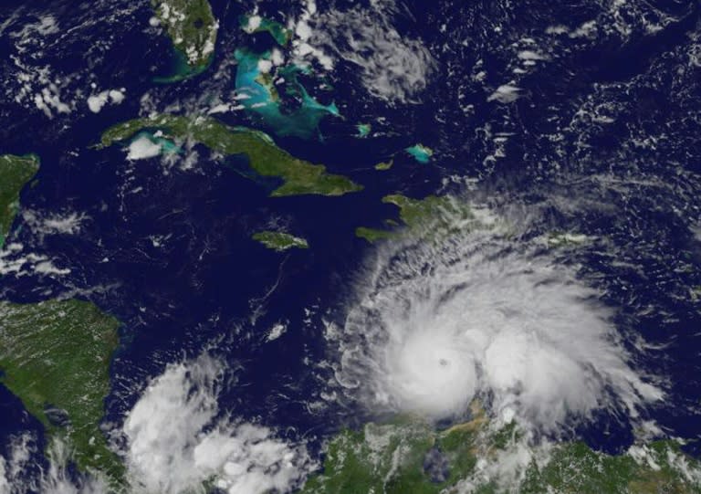 This NOAA-NASA GOES East satellite photo shows storm activity in the Atlantic Ocean on October 1, 2016