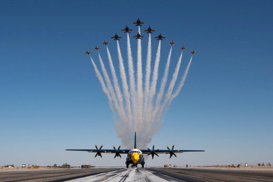 The U.S. Navy Blue Angels and Air Force Thunderbirds practice a joint formation over Imperial Valley, California. Both flight demonstration squads will be flying at the Blue Angels Homecoming Air Show Nov. 1-2.