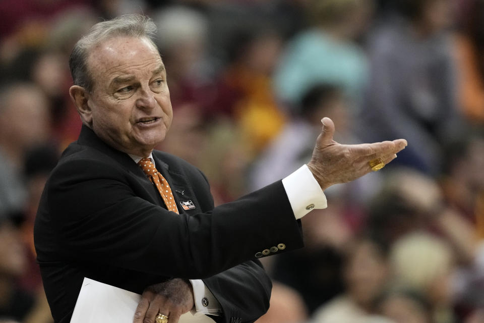 Texas head coach Vic Schaefer talks to his players during the first half of an NCAA college basketball game against Iowa State for the Big 12 tournament championship Tuesday, March 12, 2024, in Kansas City, Mo. (AP Photo/Charlie Riedel)