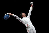 <p>Team China's Yiwen Sun explodes with emotion after defeating Team Romania's Maria Popescu in the women's épée fencing competition at Makuhari Messe Hall on July 24. </p>