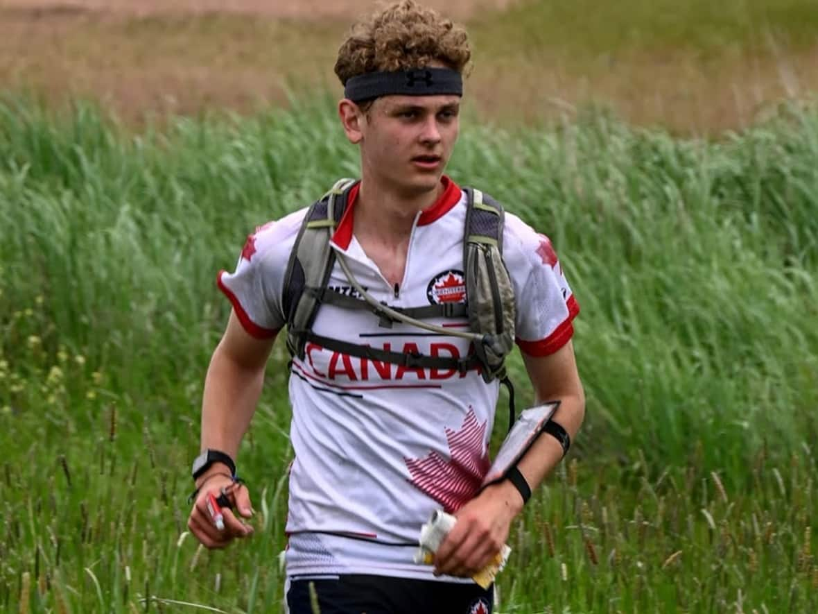 Andrew McLaren is pictured while orienteering. The sport is popular in Scandinavian countries and involves running through the forest while using a map and compass to find timing stations as quickly as possible. (Clinton Morse/Orienteering USA - image credit)