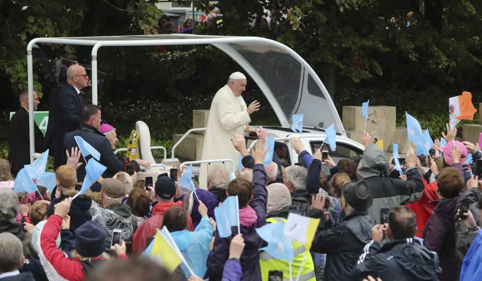 Pope Francis waves as he arrives at the Knock Shrine, in Knock, Ireland, Sunday, Aug. 26, 2018. Pope Francis is on a two-day visit to Ireland. (Niall Carson/PA via AP)