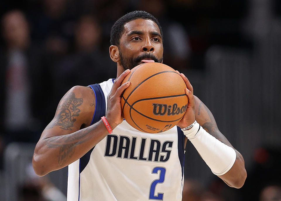 Kyrie Irving and the Dallas Mavericks agreed to a three-year, $126 million contract extension despite Irving playing only 20 games for the Mavs after being acquired last season. (Kevin C. Cox/Getty Images)