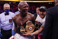 Yordenis Ugas, of Cuba, celebrates his unanimous decision win over Manny Pacquiao, of the Philippines, in a welterweight championship boxing match Saturday, Aug. 21, 2021, in Las Vegas. (AP Photo/John Locher)