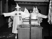 <p>Attention has been focused on the almost mythical Ku Klux Klan organization in the United States, following the allegations that Senator Black, the new Supreme Court judge, was a member of the sect. Virtually unknown, even in the U.S., a women’s branch of the Ku Klux Klan has grown into a powerful organization in the south. The women’s Klan salute to the cross at Atlanta, Georgia, on Aug. 18, 1937. (Photo: AP) </p>