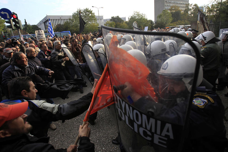 Protesters clash with police before a conference of Greek and German mayors in the northern Greek port city of Thessaloniki.
