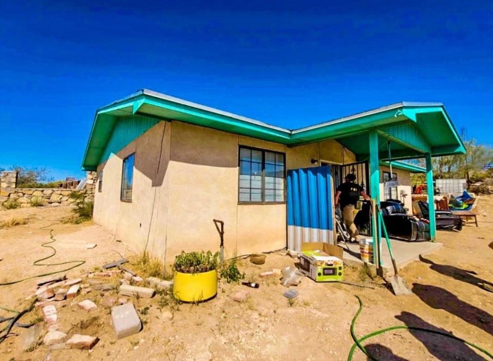 An FBI agent enters a suspected stash house where an undocumented migrant was allegedly held for ransom in the 12800 block of Chaucer Road in Sparks in eastern El Paso County on Sept. 5.