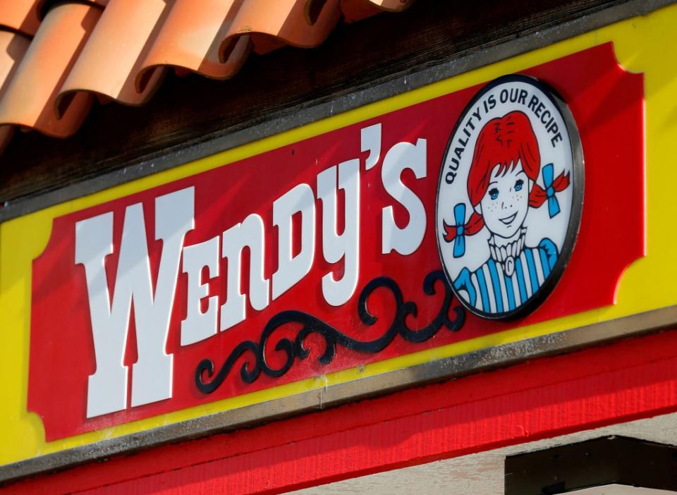 A Wendy’s sign and logo are shown at one of the company’s restaurants in Encinitas, California May 10, 2016. REUTERS