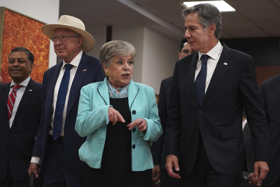 U.S. Secretary of State Antony Blinken, right, Mexican Secretary of Foreign Affairs Alicia Bárcena, center, and U.S. Ambassador to Mexico Ken Salazar, wearing hat, walk at the National Palace in Mexico City, Thursday, Oct. 5, 2023. (AP Photo/Marco Ugarte)