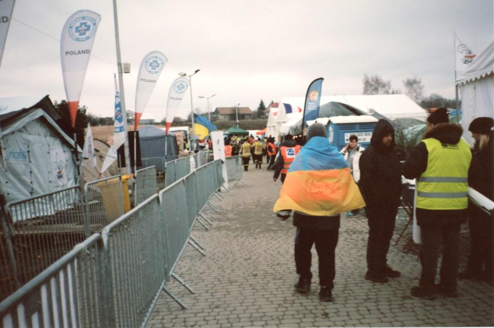 A line of tents set up by various humanitarian organizations with free food, warmth and shelter for refugees entering NATO territory. Credit: Harper Simon