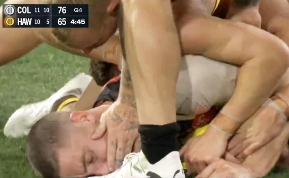 Jordan De Goey, pictured here wiping the blood from Darcy Cameron's nose.