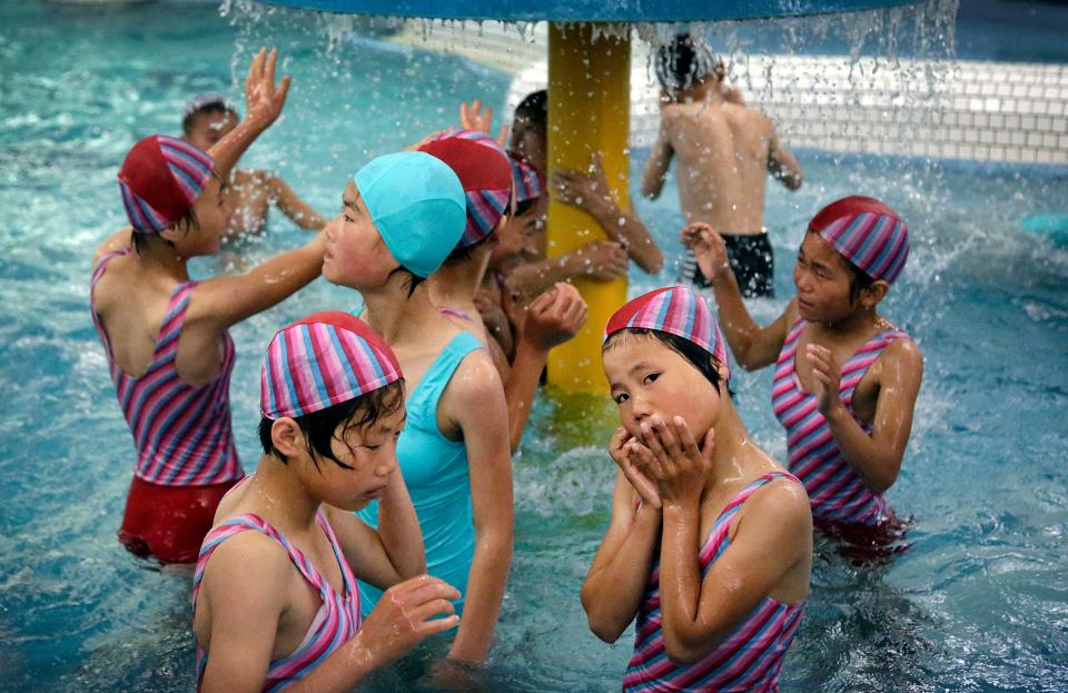 North Korean school children play in the aquatic center at the Songdowon International Children's Camp in Wonsan, North Korea, on June 23, 2016.
