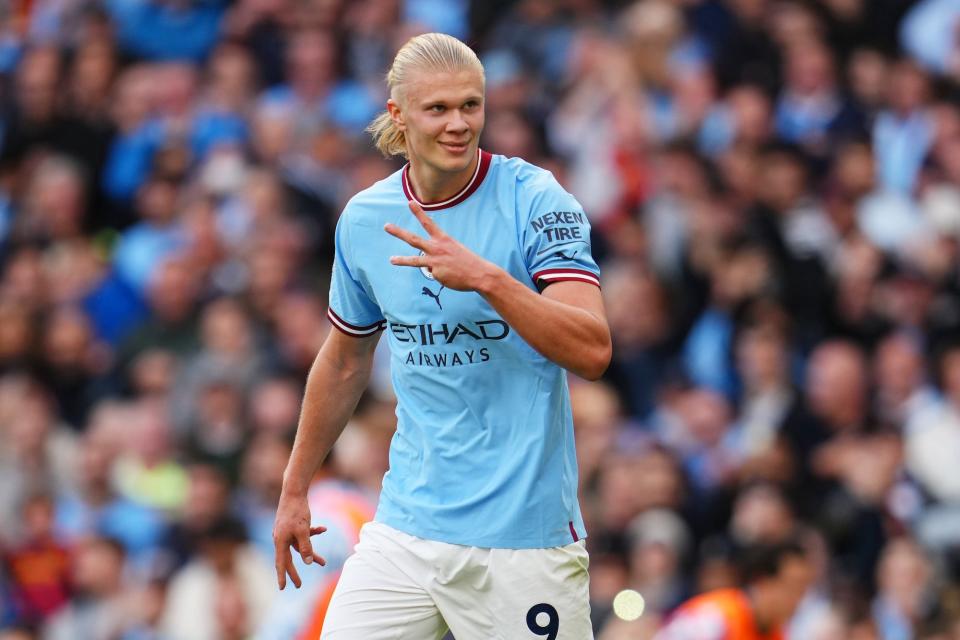 Erling Haaland of Manchester City celebrates their sides fifth goal and their hat trick during the Premier League match between Manchester City and Manchester United at Etihad Stadium.