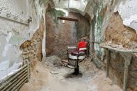 <p>Eastern State Penitentiary has long since been considered one the most haunted places in <a href="https://www.housebeautiful.com/design-inspiration/house-tours/a3808/modern-philadelphia-castle/" rel="nofollow noopener" target="_blank" data-ylk="slk:Philly" class="link ">Philly</a>. The building was the largest American prison at its completion in 1829 and remained operational until 1971, serving as the model for hundreds of prisons in the 19th and 20th centuries. Infamous criminals like Al Capone and Willie Sutton were inmates here — but the penitentiary is even <em>more</em> famous for its associations with the occult. It's been featured on countless ghost shows, like Travel Channel's <em>Ghost Adventures,</em> Syfy's <em>Ghost Hunters,</em> and MTV's <em>Fear</em><span class="redactor-invisible-space">, but even more convincing are the accounts of those who have been inside the prison and unknowingly confirmed each other's accounts. Certain cell blocks are associated with different chilling events, like <a href="http://www.npr.org/2013/10/24/232234570/is-eastern-state-penitentiary-really-haunted" rel="nofollow noopener" target="_blank" data-ylk="slk:echoing voices, cackling, and wailing" class="link ">echoing voices, cackling, and wailing</a>. </span>Its colloquial acronym, ESP, is <em>also </em><span class="redactor-invisible-space">the acronym for extrasensory perception, more commonly referred to as the "sixth sense." Coincidence? We think not.</span></p>