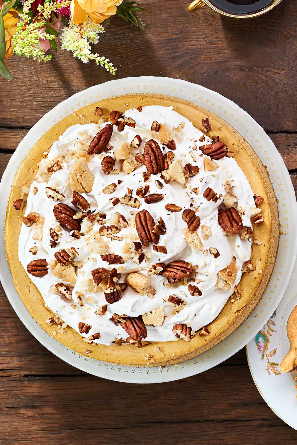 <p>Save room for a second slice of this creamy cheesecake.</p><p><strong><a href="https://www.countryliving.com/food-drinks/recipes/a40037/pumpkin-cheesecake-with-cookie-crust-recipe/" rel="nofollow noopener" target="_blank" data-ylk="slk:Get the recipe.;elm:context_link;itc:0;sec:content-canvas" class="link ">Get the recipe.</a></strong></p>